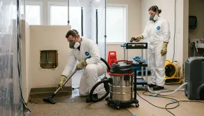 Water damage crew cleaning up burst pipe water in Port Charlotte, FL home